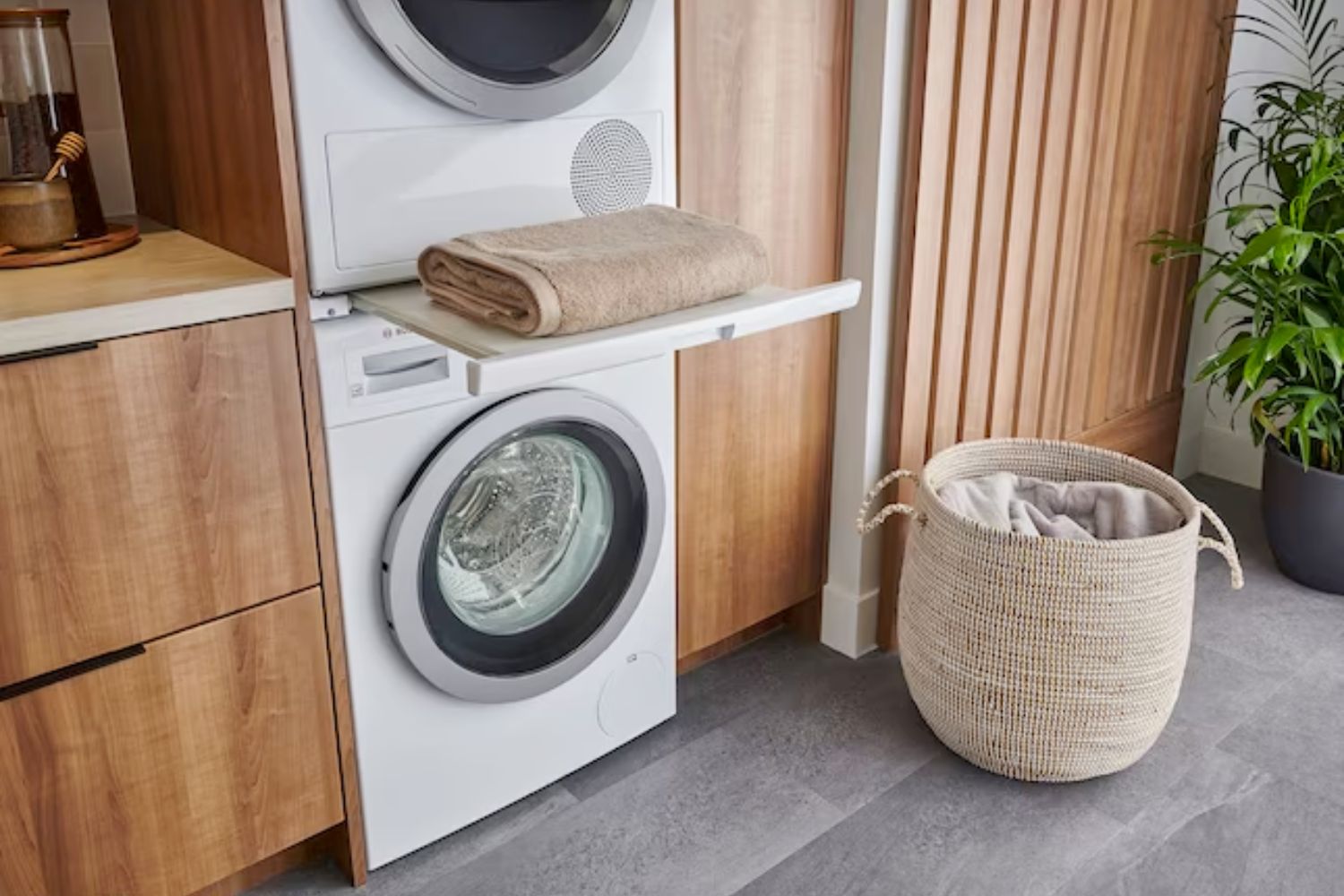 The best heat pump dryer installed in a wall of cabinetry in a modern living space.